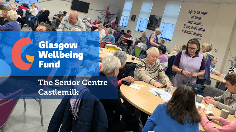 photo of lots of tables of people at Castlemilk's Senior Centre